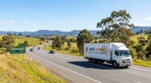 Apex Moving interstate removal truck travelling on a country highway between Melbourne and Sydney